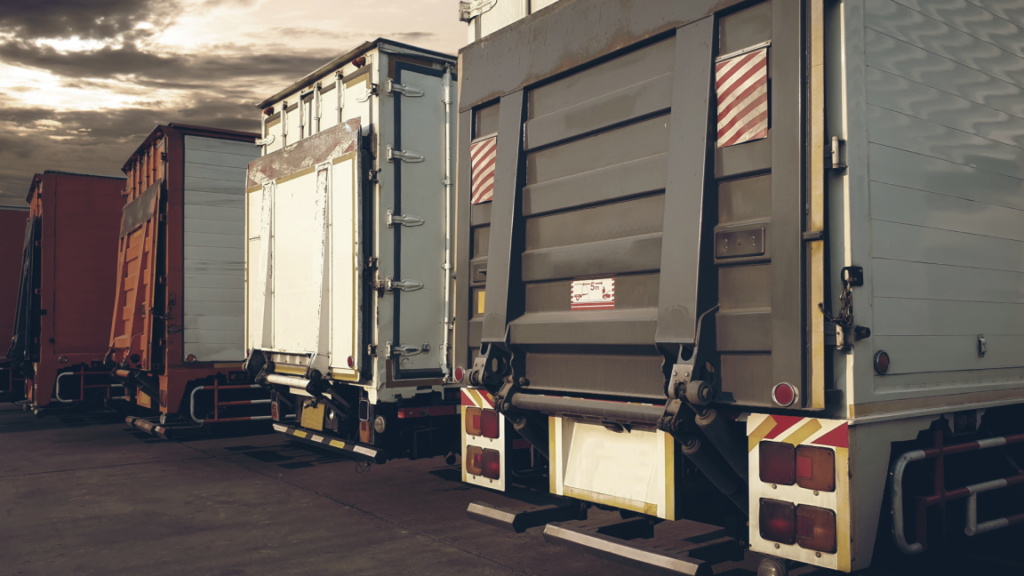 compliance manager reviewing a USDOT compliance checklist for registration, MCS-150 updates, and fleet changes